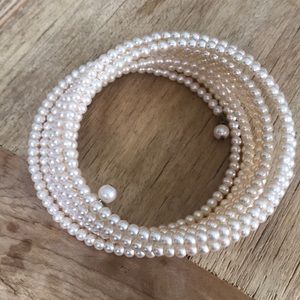 Faux pearl bracelet.